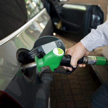 close-up-hand-holding-gas-pump